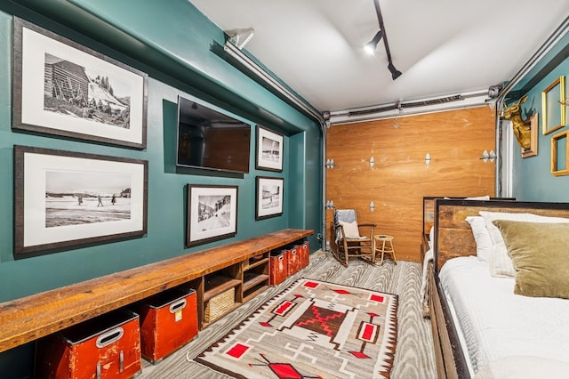 153 Slopeside Dr Unit 14, Whitefish, MT 59937 - bedroom featuring a garage and wood walls