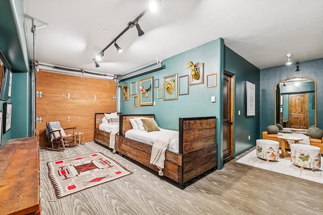 153 Slopeside Dr Unit 14, Whitefish, MT 59937 - bedroom with arched walkways and track lighting