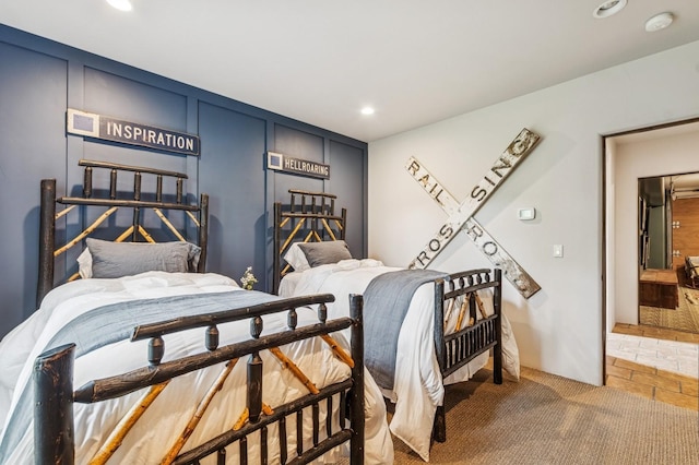 153 Slopeside Dr Unit 14, Whitefish, MT 59937 - bedroom featuring recessed lighting and light carpet
