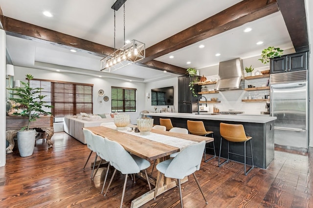 153 Slopeside Dr Unit 14, Whitefish, MT 59937 - dining space with dark wood-type flooring, recessed lighting, and beamed ceiling