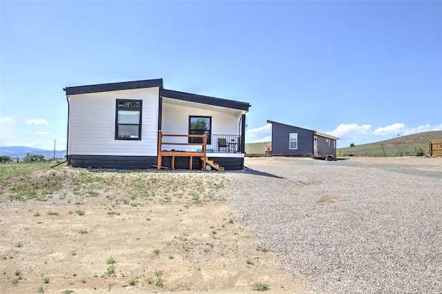 5610 Hauser Damn Rd, Helena, MT 59602 - view of front of house featuring a mountain view