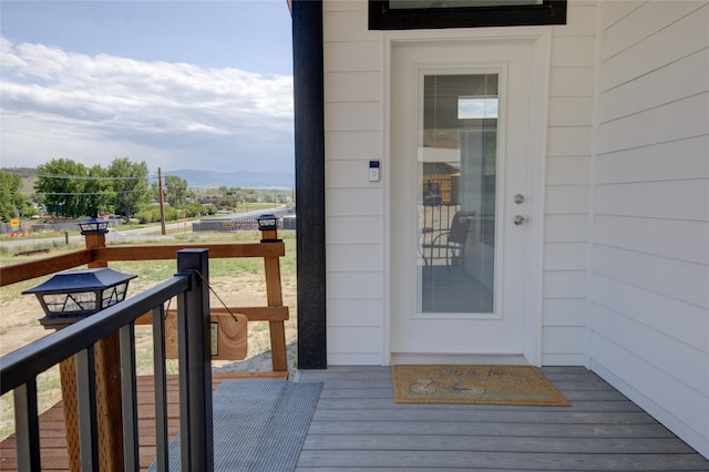5610 Hauser Damn Rd, Helena, MT 59602 - property entrance with a deck with mountain view