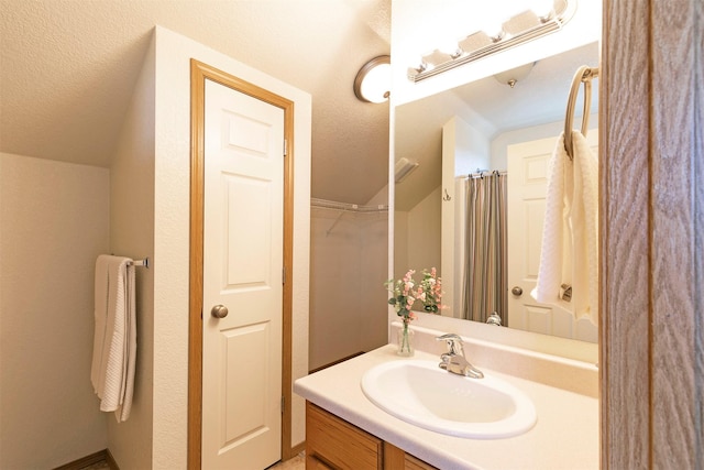 4431 Chesapeake Way, Missoula, MT 59808 - full bath with vanity and vaulted ceiling