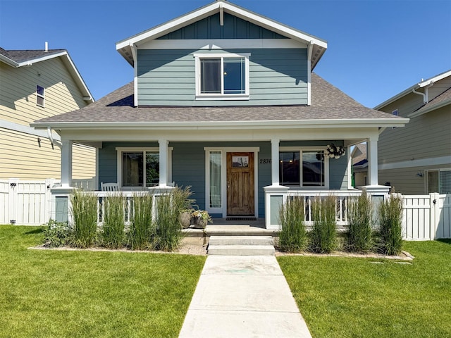 2876 Twilight Ave, Helena, MT 59601 - view of front of property featuring covered porch, roof with shingles, a gate, and board and batten siding