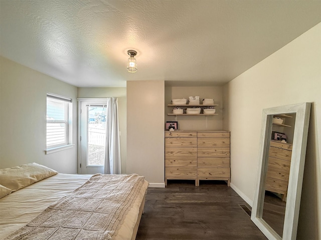 2876 Twilight Ave, Helena, MT 59601 - bedroom featuring dark wood finished floors and a textured ceiling