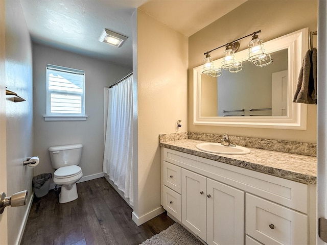 2876 Twilight Ave, Helena, MT 59601 - full bathroom featuring wood finished floors, vanity, and a shower with shower curtain