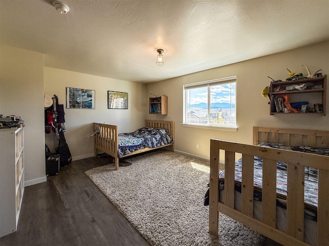 2876 Twilight Ave, Helena, MT 59601 - bedroom with dark wood-style flooring and baseboards