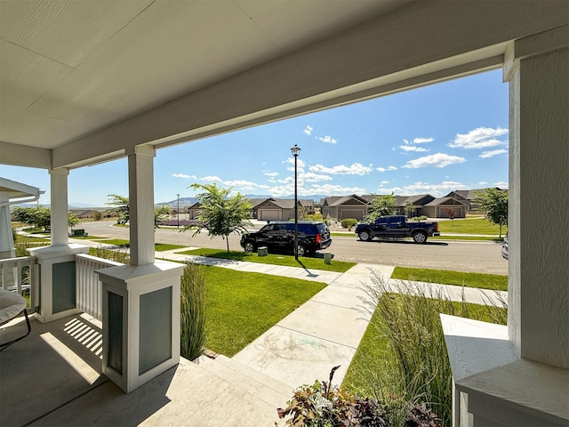 2876 Twilight Ave, Helena, MT 59601 - covered porch featuring a residential view and a yard