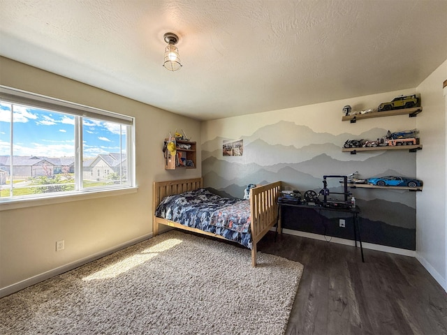 2876 Twilight Ave, Helena, MT 59601 - bedroom featuring baseboards and wood finished floors
