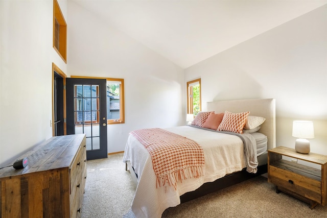 183B Eagle Bend Dr, Bigfork, MT 59911 - bedroom featuring light carpet and high vaulted ceiling