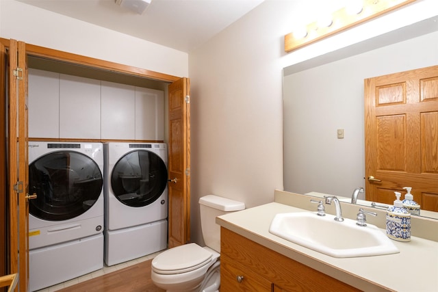 183B Eagle Bend Dr, Bigfork, MT 59911 - bathroom with washing machine and clothes dryer and vanity