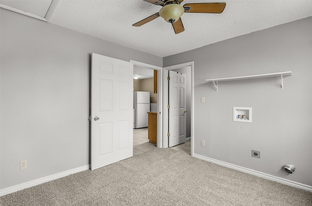 1312 2nd Ave NW, Great Falls, MT 59404 - washroom with hookup for an electric dryer, light colored carpet, washer hookup, ceiling fan, and a textured ceiling