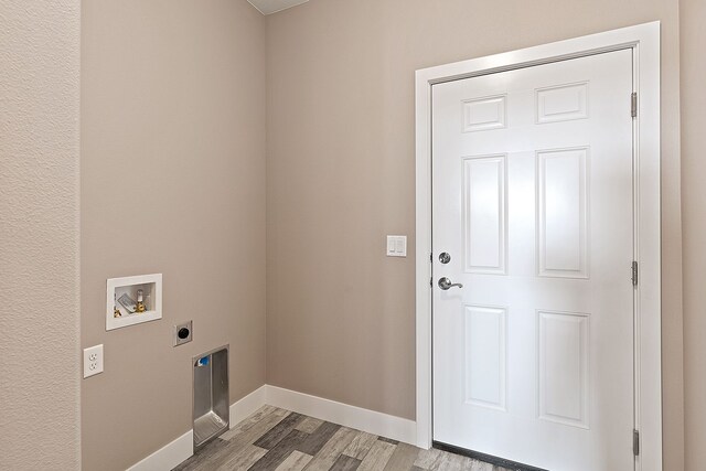 243 Stirling Loop, East Helena, MT 59635 - washroom featuring electric dryer hookup, hookup for a washing machine, and light wood-type flooring