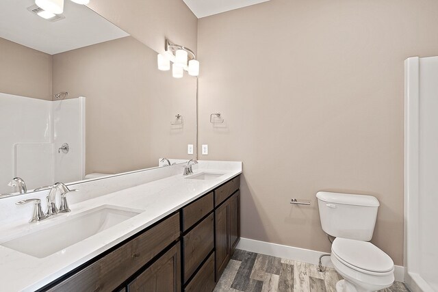 243 Stirling Loop, East Helena, MT 59635 - full bath with wood finished floors, double vanity, and a shower