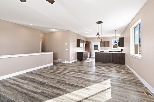 243 Stirling Loop, East Helena, MT 59635 - unfurnished living room featuring dark wood finished floors, recessed lighting, and ceiling fan