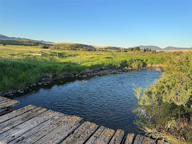 30 Kolbeck Ln, Hall, MT 59837 - dock featuring a water and mountain view