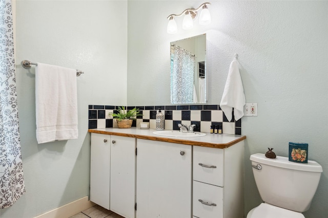 915 3rd St, Missoula, MT 59802 - full bathroom featuring vanity and backsplash