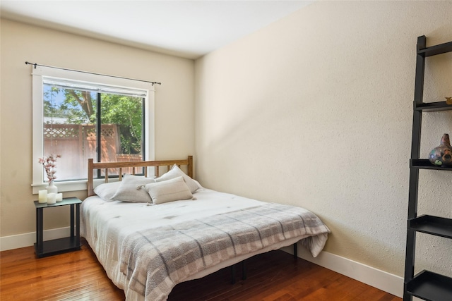 915 3rd St, Missoula, MT 59802 - bedroom with hardwood / wood-style floors and baseboards
