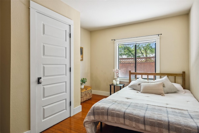 915 3rd St, Missoula, MT 59802 - bedroom featuring wood finished floors and baseboards