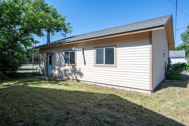915 3rd St, Missoula, MT 59802 - view of home's exterior with a shingled roof