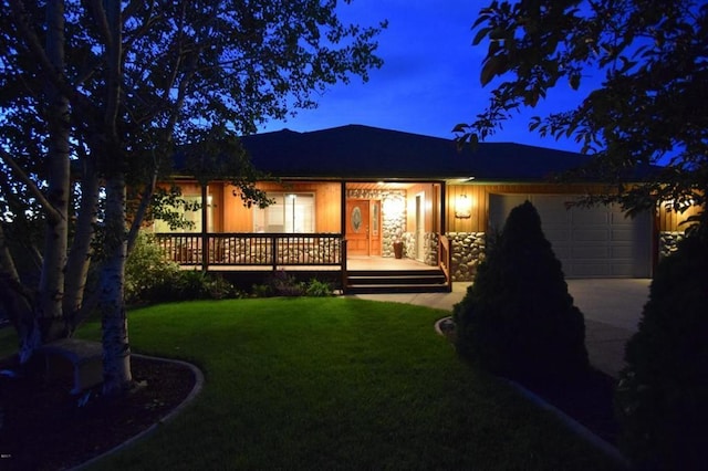 3640 Jack Dr, Missoula, MT 59803 - back of property with an attached garage, driveway, and a lawn
