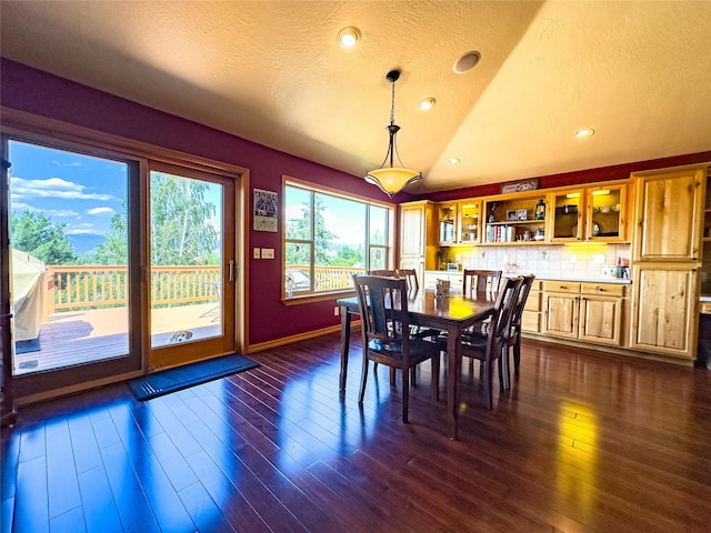 3640 Jack Dr, Missoula, MT 59803 - dining area featuring dark wood-type flooring, a textured ceiling, vaulted ceiling, and recessed lighting