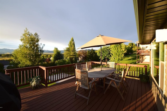 3640 Jack Dr, Missoula, MT 59803 - deck with outdoor dining area and a mountain view