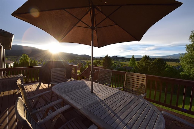 3640 Jack Dr, Missoula, MT 59803 - wooden deck with outdoor dining area and a mountain view