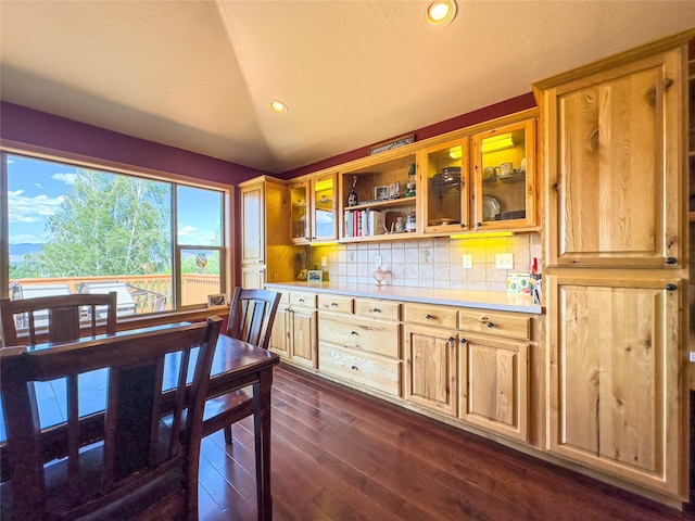 3640 Jack Dr, Missoula, MT 59803 - kitchen with light countertops, tasteful backsplash, recessed lighting, dark wood-style flooring, and glass insert cabinets