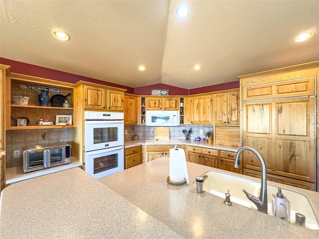 3640 Jack Dr, Missoula, MT 59803 - kitchen with white appliances, open shelves, vaulted ceiling, light countertops, and a textured ceiling