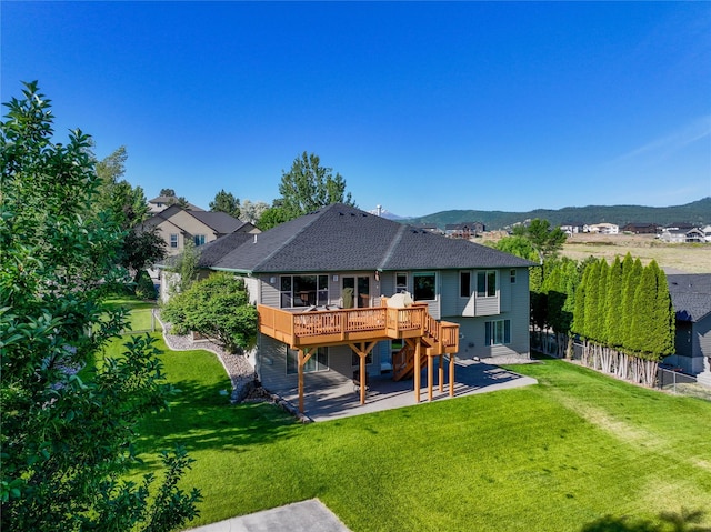 3640 Jack Dr, Missoula, MT 59803 - back of house featuring a patio area, a deck with mountain view, stairway, and a shingled roof