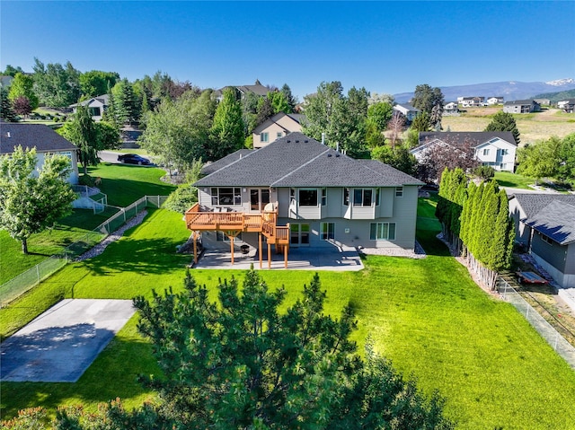 3640 Jack Dr, Missoula, MT 59803 - rear view of house with a wooden deck, a patio area, a residential view, stairway, and roof with shingles