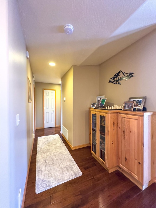 3640 Jack Dr, Missoula, MT 59803 - doorway featuring dark wood-style flooring and baseboards