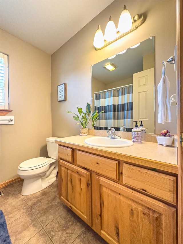 3640 Jack Dr, Missoula, MT 59803 - full bath featuring vanity, tile patterned floors, and a shower with curtain