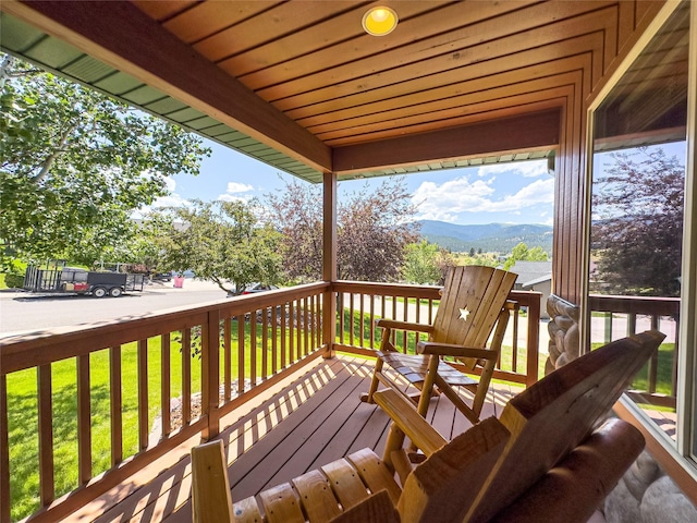 3640 Jack Dr, Missoula, MT 59803 - wooden terrace with a mountain view and a lawn