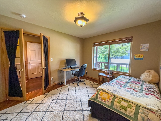 3640 Jack Dr, Missoula, MT 59803 - bedroom with light wood finished floors and a desk