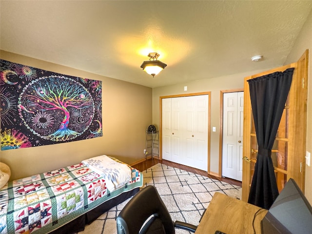 3640 Jack Dr, Missoula, MT 59803 - bedroom with wood finished floors and two closets