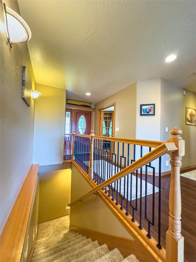 3640 Jack Dr, Missoula, MT 59803 - stairs featuring a textured ceiling and recessed lighting