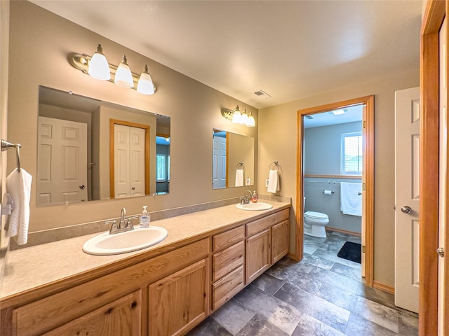 3640 Jack Dr, Missoula, MT 59803 - full bath with double vanity and stone finish flooring