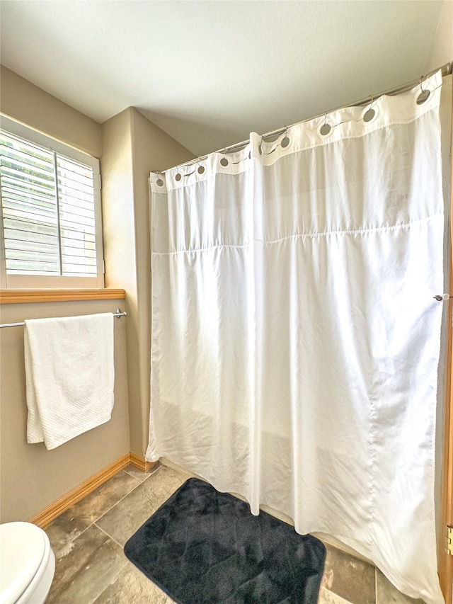 3640 Jack Dr, Missoula, MT 59803 - full bathroom featuring a shower with shower curtain and tile patterned flooring