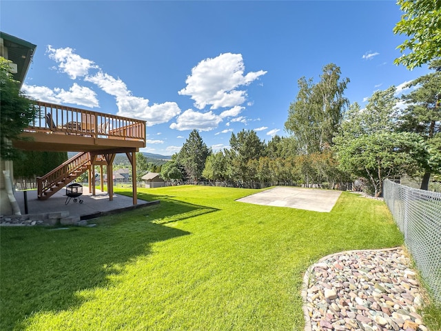 3640 Jack Dr, Missoula, MT 59803 - view of yard featuring a patio, stairs, and a deck