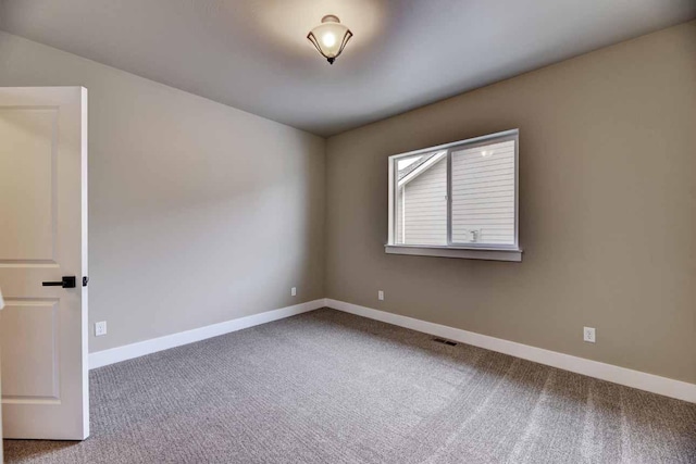 2909 Travis Ave, Helena, MT 59601 - spare room with carpet and baseboards