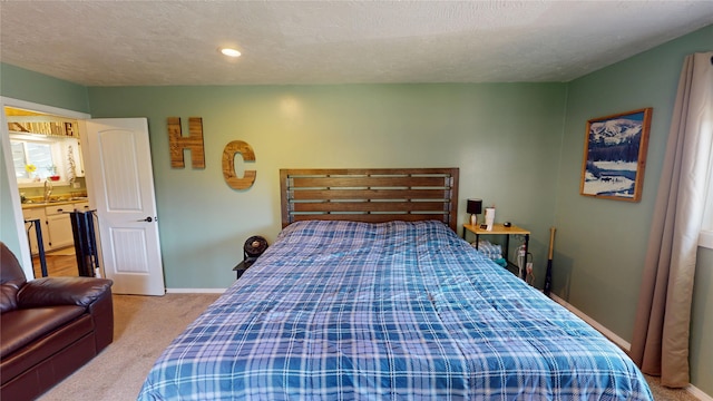 181 Ridgeway Dr, Lolo, MT 59847 - carpeted bedroom featuring a sink and recessed lighting
