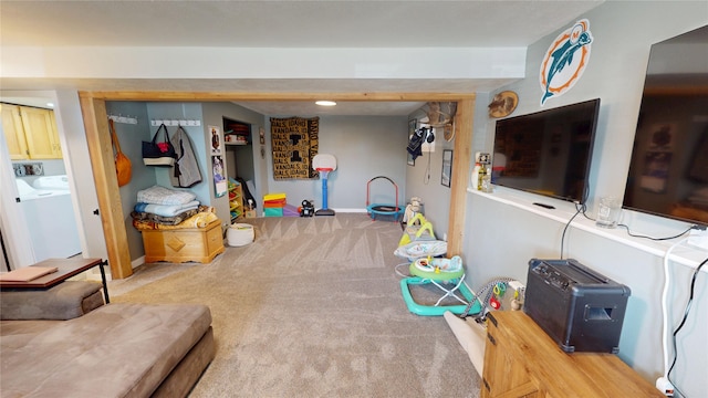 181 Ridgeway Dr, Lolo, MT 59847 - playroom featuring carpet flooring and independent washer and dryer