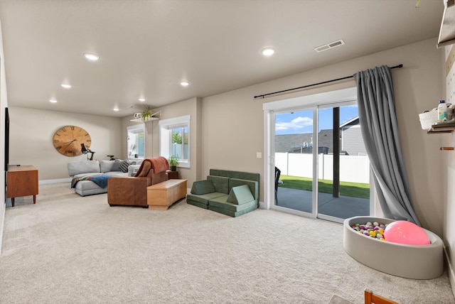 7070 Max Dr, Missoula, MT 59803 - carpeted living room with recessed lighting and baseboards