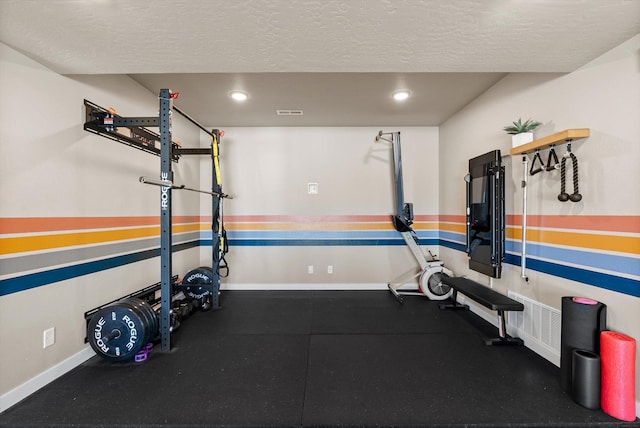 7070 Max Dr, Missoula, MT 59803 - workout room with a textured ceiling and recessed lighting