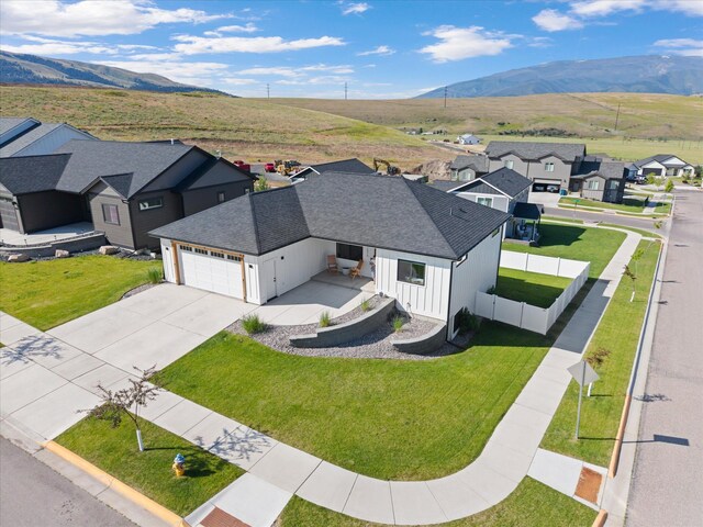 7070 Max Dr, Missoula, MT 59803 - aerial view of residential area featuring a mountain backdrop