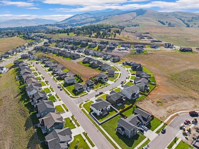 7070 Max Dr, Missoula, MT 59803 - aerial view of property and surrounding area with a mountainous background and nearby suburban area
