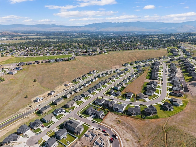 7070 Max Dr, Missoula, MT 59803 - aerial overview of property's location featuring a mountain backdrop and nearby suburban area