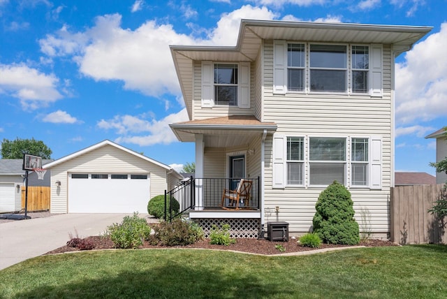 1735 Bluestone Dr, Kalispell, MT 59901 - view of front of home with a detached garage and covered porch